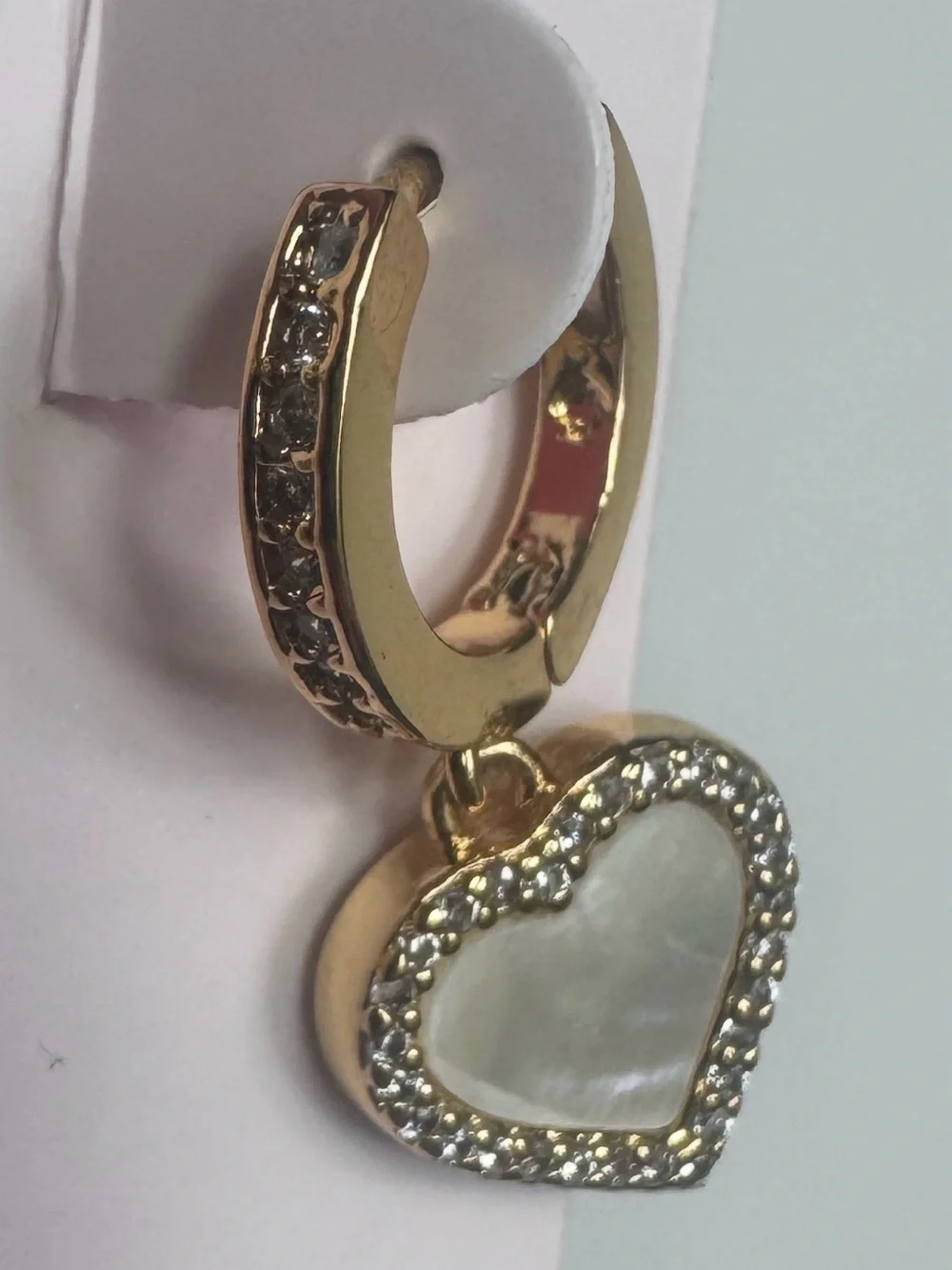 Kate Spade Mother of Pearl Gold Heart Huggies earrings